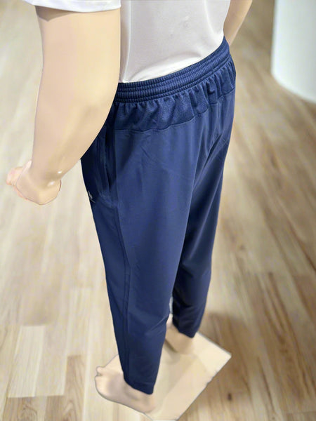 Navy blue pants on a mannequin against a neutral background